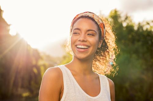 Woman smiling outdoors